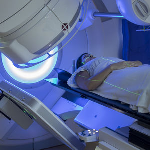 Woman receiving radiation therapy 