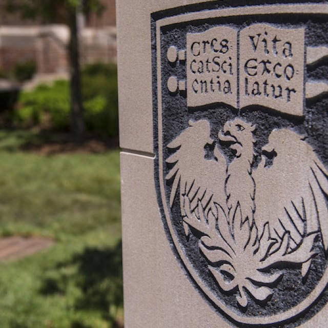 UChicago crest engraved in stone