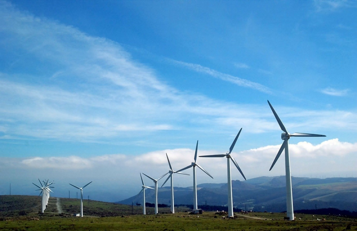 Wind farm turbines along a hillside