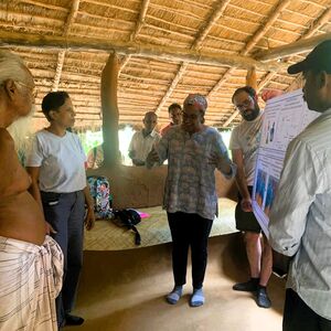 Researchers discussing results with community leaders in Sri Lanka